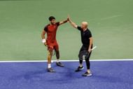 Carlos Alcaraz and Andre Agassi during an exhibition match ahead of the 2024 US Open (Image via Getty)